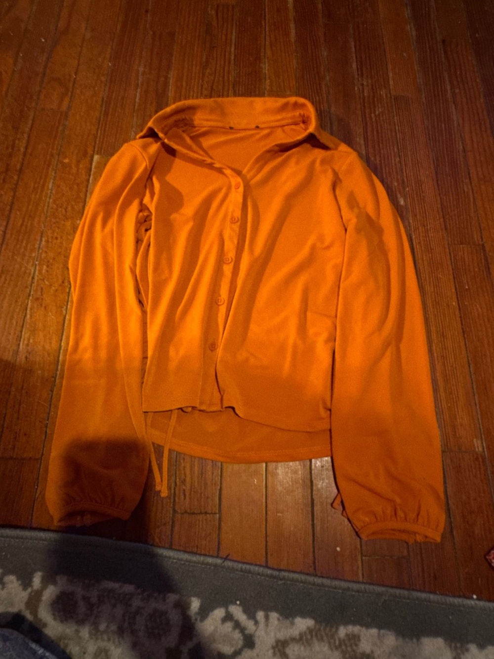 Gorgeous orange boutique stretchy top button front cinched sides